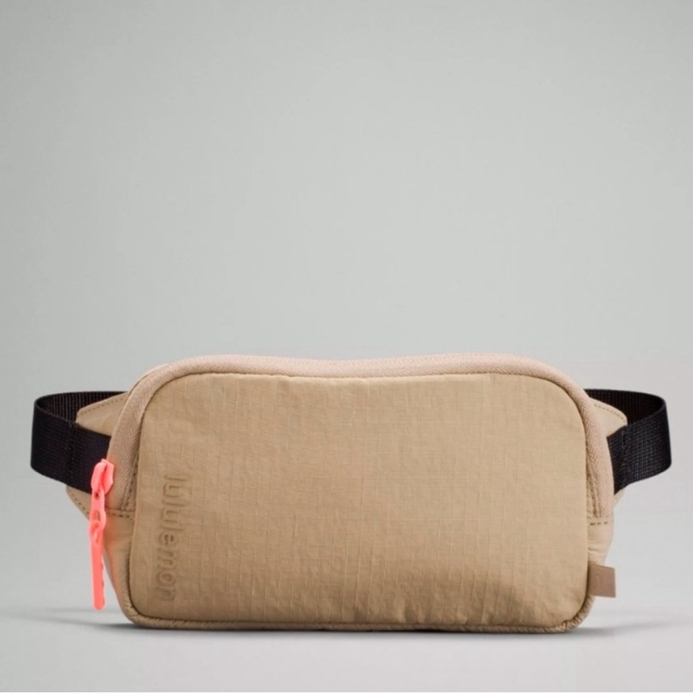 Khaki & pink Lululemon belt bag